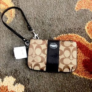 Coach wristlet. Brown cloth